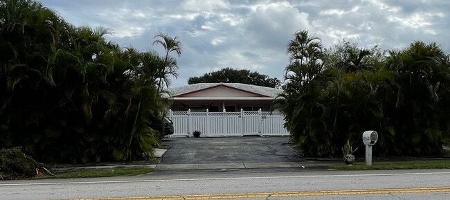 Front - 210 NW 4th Ave