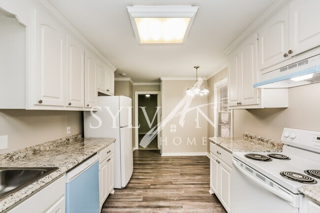 Building Photo - The living is easy in this 3 bedroom, 2 ba...
