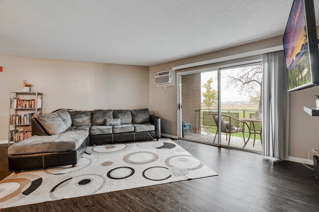 Northview Commons Living Area & Balcony - Northview Commons