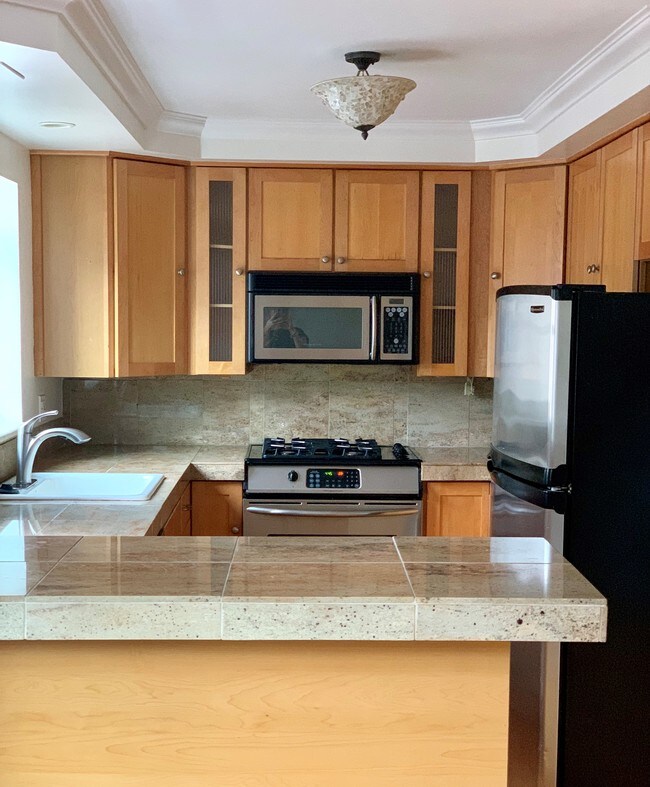 Kitchen with Breakfast Bar - 2047 S Milwaukee St