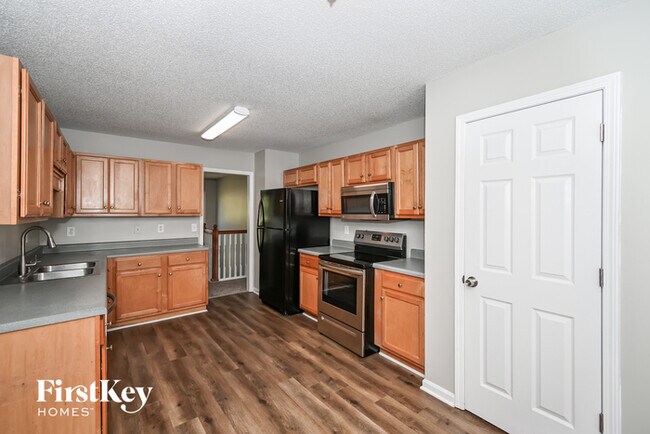 Building Photo - 7775 Poppy Dr