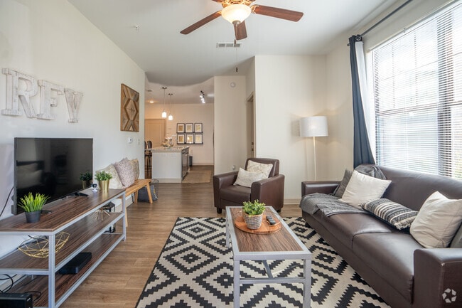 3BR, 3BA - 1,216SF - Living Room - The Shops at Riverfront Village