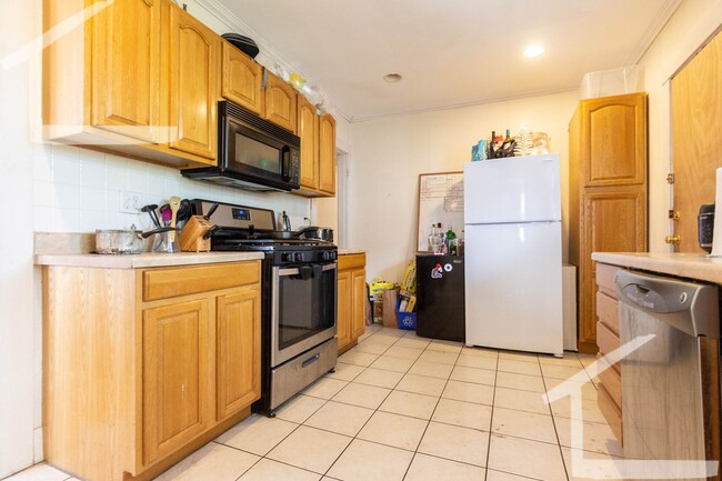 Photo - No Brokers Fee, Top Floor Unit, Porch, Laundry, Steps from the T Stop Apartment