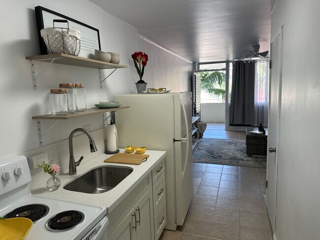 Foto del edificio - Renovated 1 bedroom unit with enclosed lan...