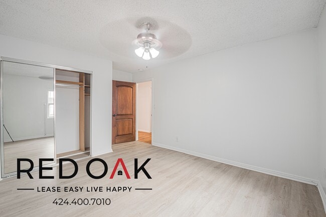 Building Photo - 1309 W 36th Pl