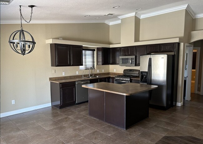 Foto del edificio - 11572 E 26th St