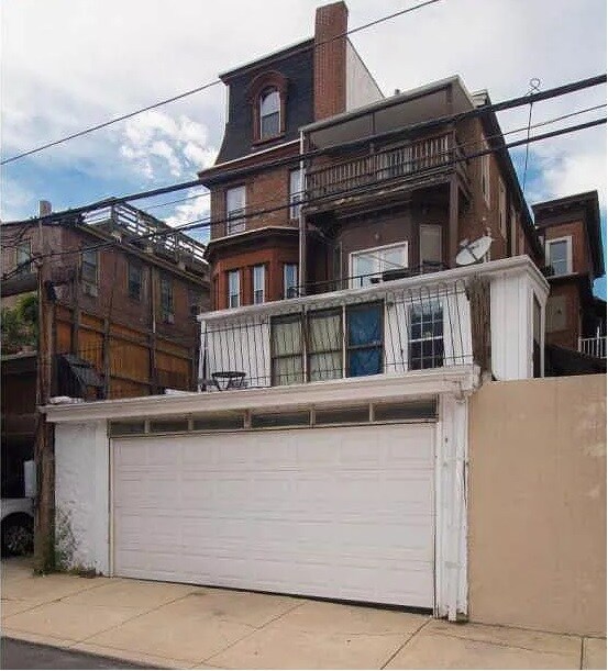 Garage behind unit. One space is reserved for tenant in unit 1F. - 1912 Spring Garden St