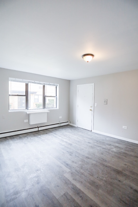 Building Photo - 1660 W Pratt Blvd