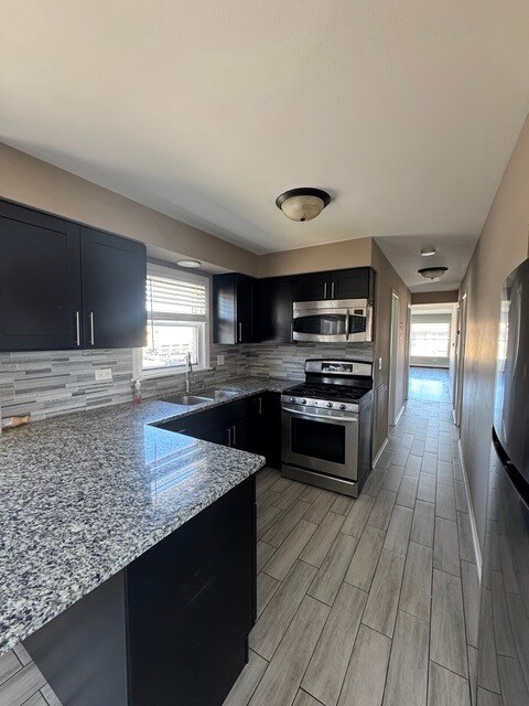 Foto del edificio - 7249 W Belmont Ave