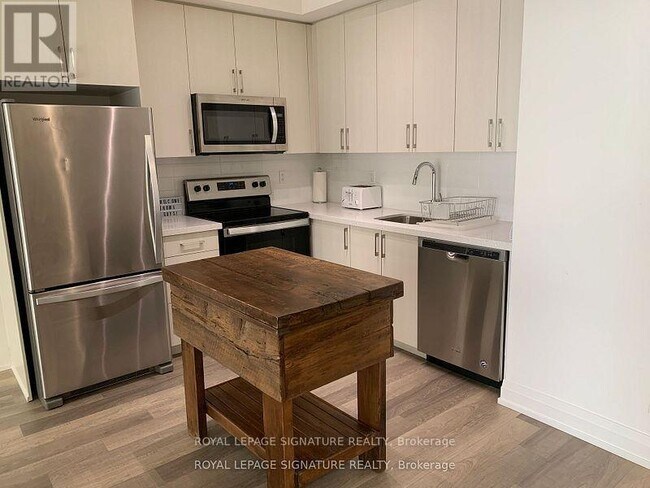 Photo du bâtiment - 3121-3121 Sheppard Ave E