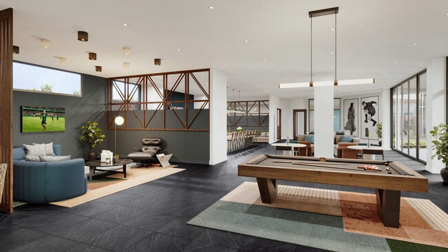 Experience luxury living with this open-concept recreational area, perfect for relaxation and entertainment. - Pearl Springdale