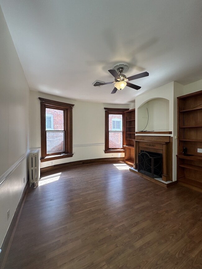 TV space and built-in shelves - 2329 W Grace St