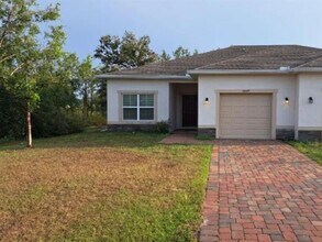 Building Photo - 26077 Sandhill Blvd
