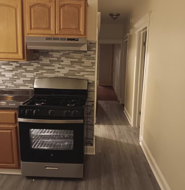 Kitchen with New Stainless Stove - 324 Hawthorne Ave