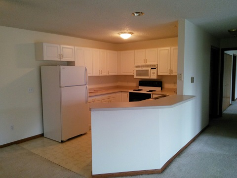 Cocina con desayunador - River Ridge Apartments-Waupaca