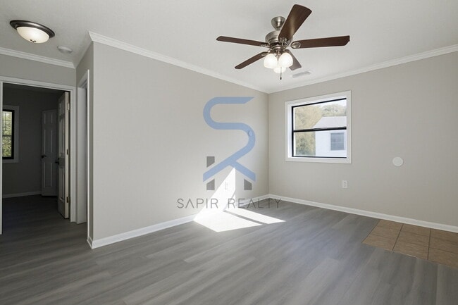 Building Photo - Move in before December 31st and choose your reward: a $250 Amazon Gift Card or a 55" Smart TV!