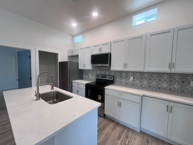 Building Photo - Coming soon! Just renovated! Stunning High...