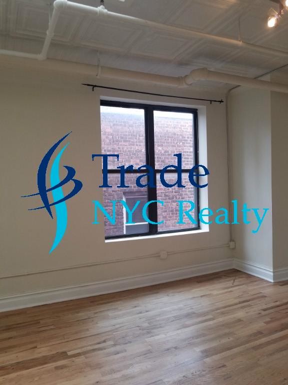 Foto del edificio - 115 W 23rd St