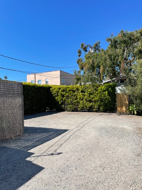 parking inside gravel area - 661 Westminster Ave