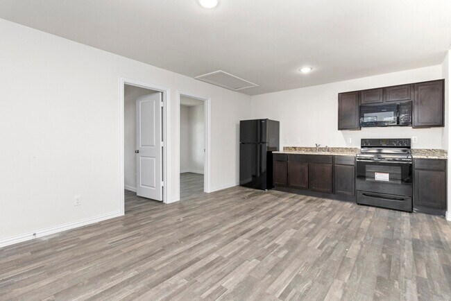 Building Photo - 415 E Garrison Ave