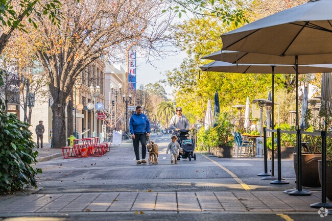 Residents enjoy a leisurely stroll through downtown Redwood City.