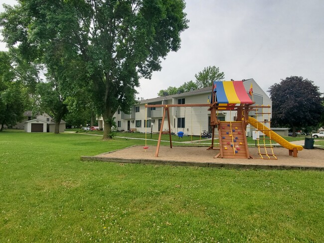 large yard and playground - Northwood Apartments, a Section 8 Community