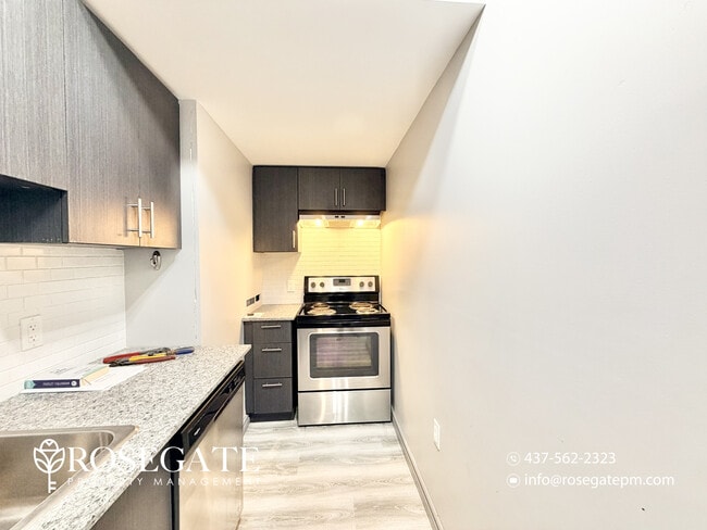 Photo du bâtiment - Modern 2-Bedroom Condo with Balcony – Utilities Included in Waterloo