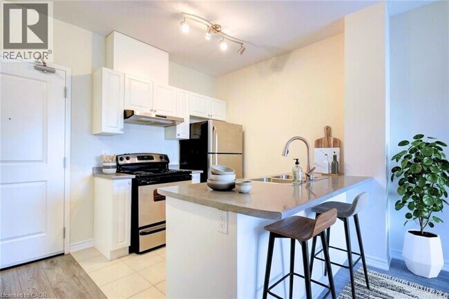 Photo du bâtiment - 1360 Costigan Rd