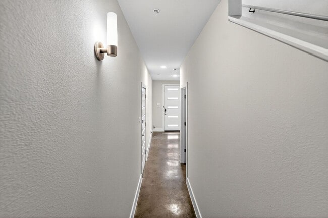 Building Photo - Modern Luxury Townhome in Gated Community – Rooftop Balcony & Premium Upgrades!