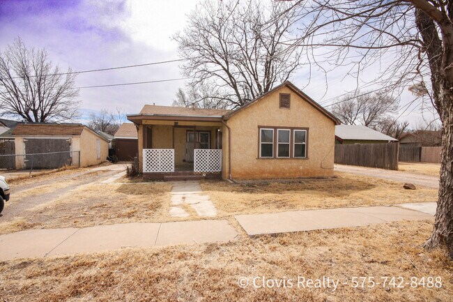 Front of House - 613 E 10th St
