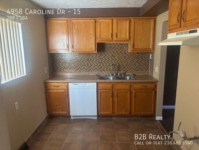 Building Photo - 4958 Caroline Dr