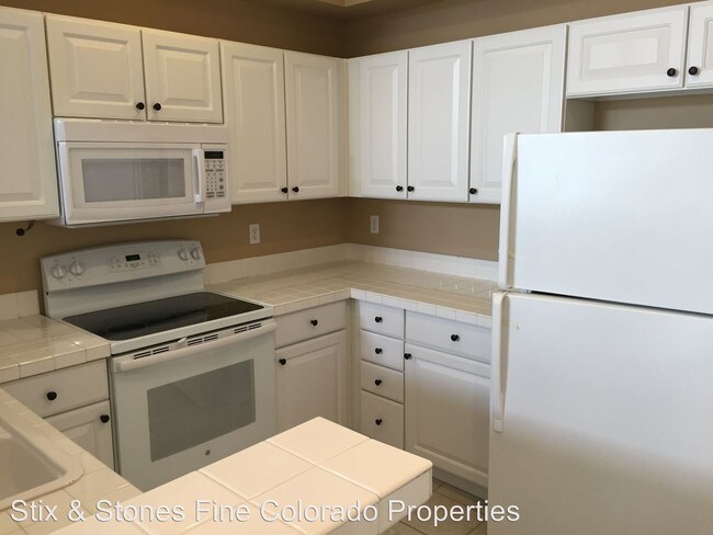 Building Photo - 9072 W Phillips Dr