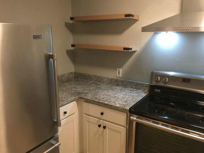 Kitchen with new hood - 110 Main St