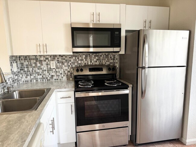 Building Photo - 12178 SW 143rd Ln