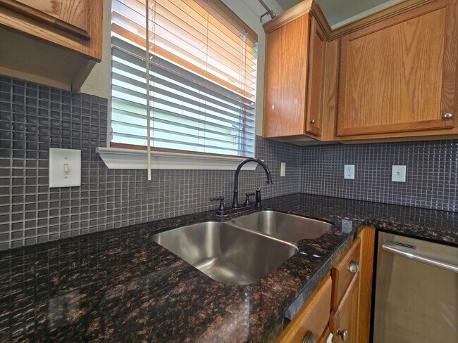 Building Photo - RENT REDUCTION - AVAILABLE NOW!