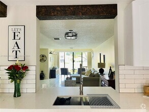 Building Photo - 3963 Cocoplum Cir