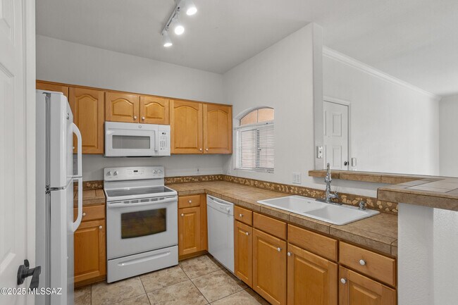 Building Photo - 7050 E Sunrise Dr