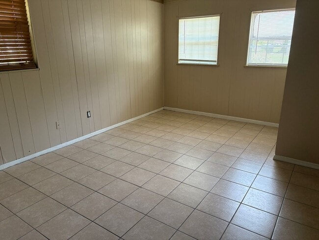 Building Photo - Spacious home on shaded lot off the main path