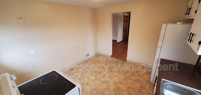 Building Photo - 5706-5708 Poketa Rd.