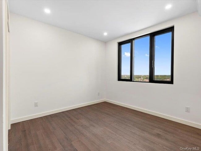 Building Photo - 124-28 Queens Blvd