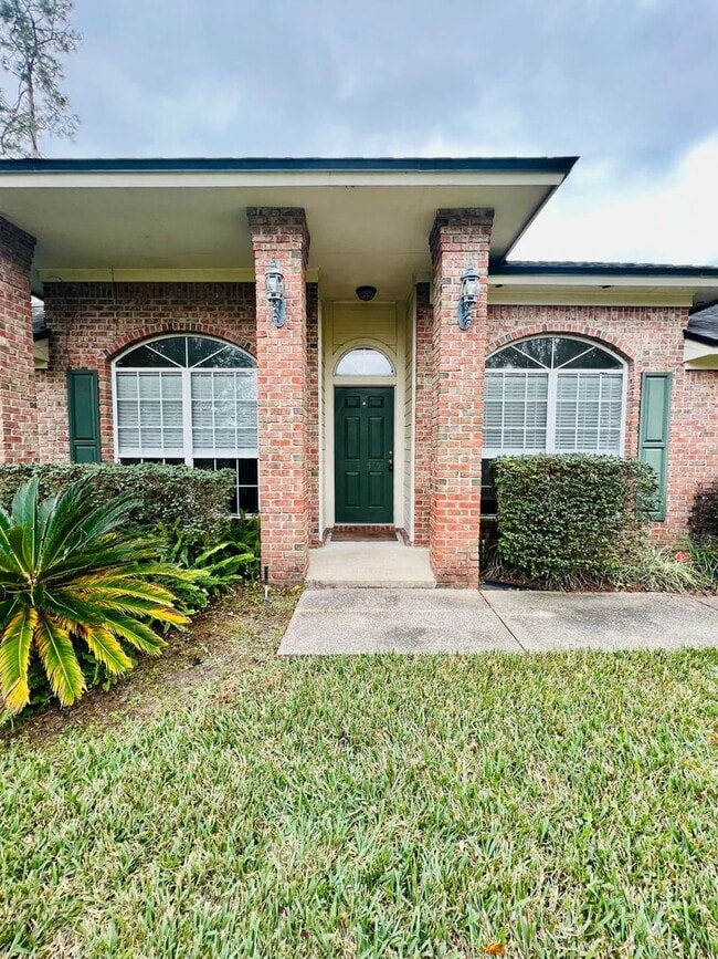 Building Photo - Behind the Gates: A Corner-Lot 4 bedroom, 2 bath Retreat in Coveted Pace Island!!