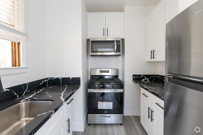 Building Photo - Welcome to The Du Barry — Modern Living in...