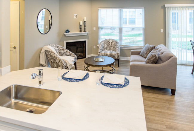 Typical Phase II Great Room viewed from the kitchen sink/breakfast bar - Lehigh Park Townhouses & Apartments