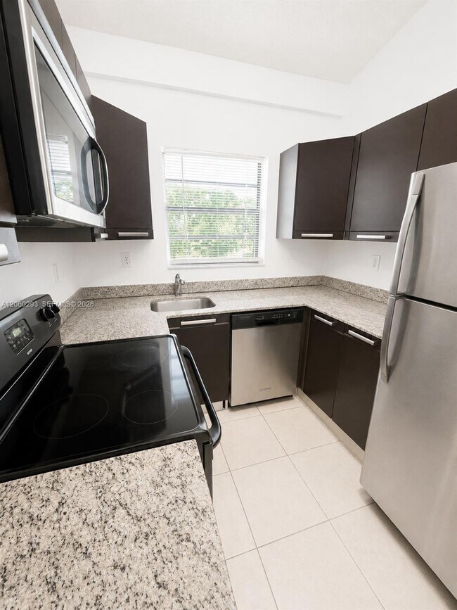 Building Photo - 11219 Royal Palm Blvd
