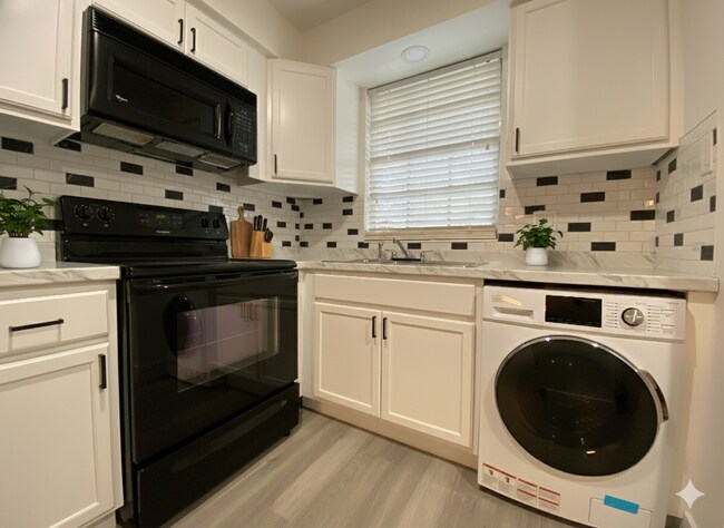 Foto del edificio - Charming 1-Bedroom Condo in Scenic Winter ...