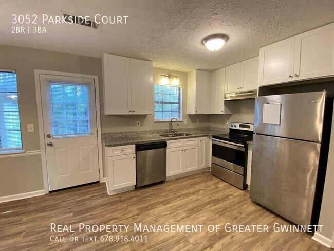 Foto del edificio - Cozy 2 Bedroom Townhome Near the Heart of ...
