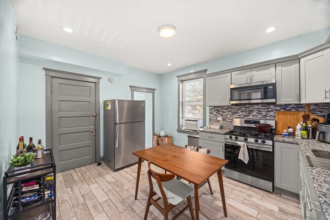 Building Photo - 4104 W 24th Pl
