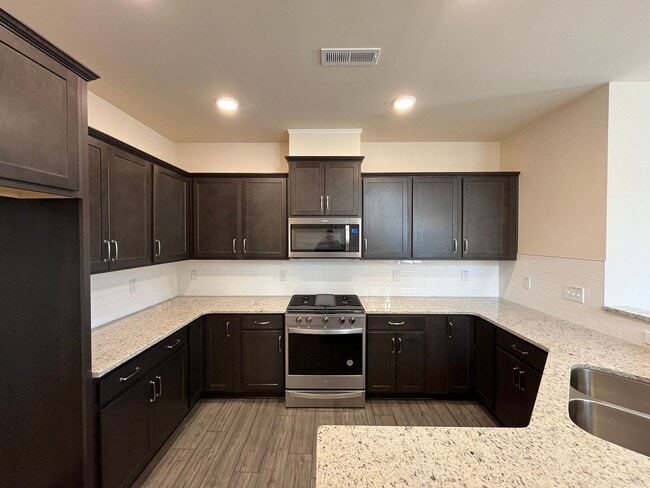 Building Photo - Newly Built 3BD, 2.5BA End Unit Raleigh Townhome with 2-Car Attached Garage