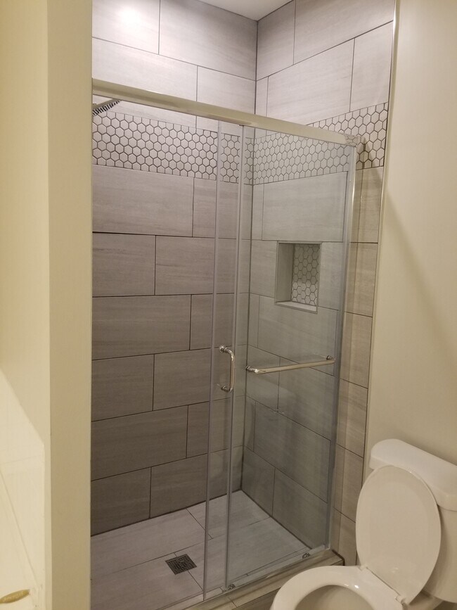 Updated master bath. New tile, waterfall shower head - 2720 Bellforest Ct