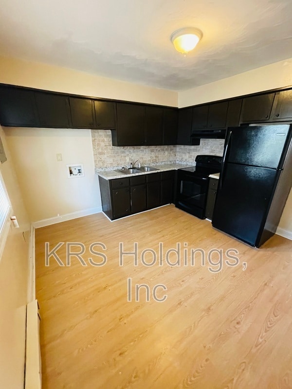Photo - 1406 W 27th St Apartment